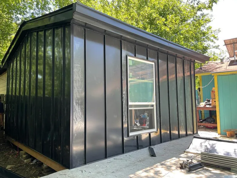 Black standing seam metal wall panels for Metal Roof Installation in Wake Village