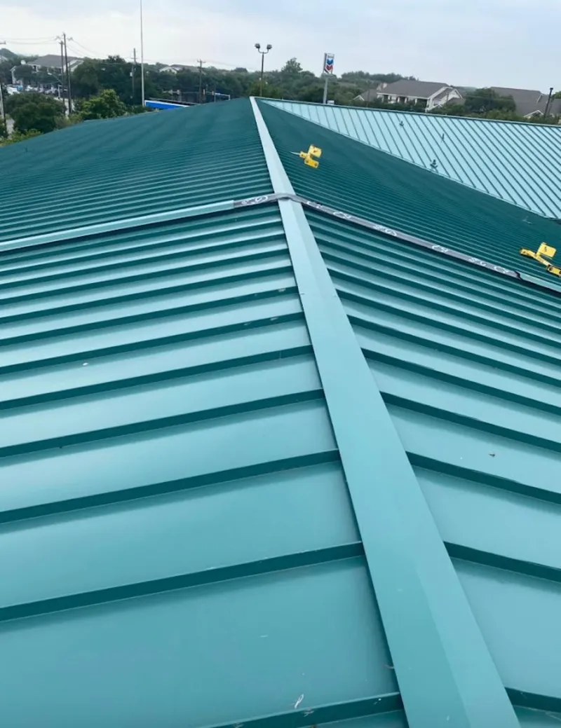 Green commercial metal roof ridge and valley for Metal Roof Repair in Wake Village