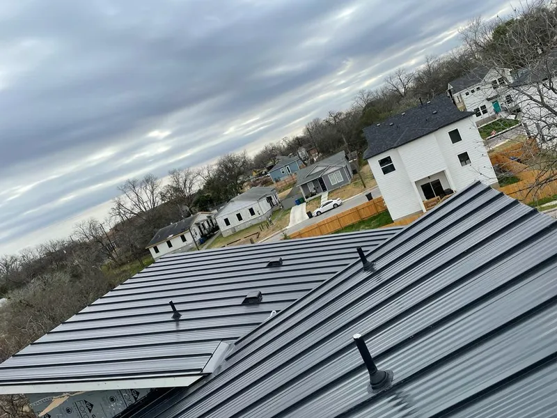 Standing seam metal roof panels with vents for Skylight Repair in Wake Village
